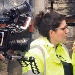 Abby Mangold on factory floor ahead of filming for BBC Inside the Factory