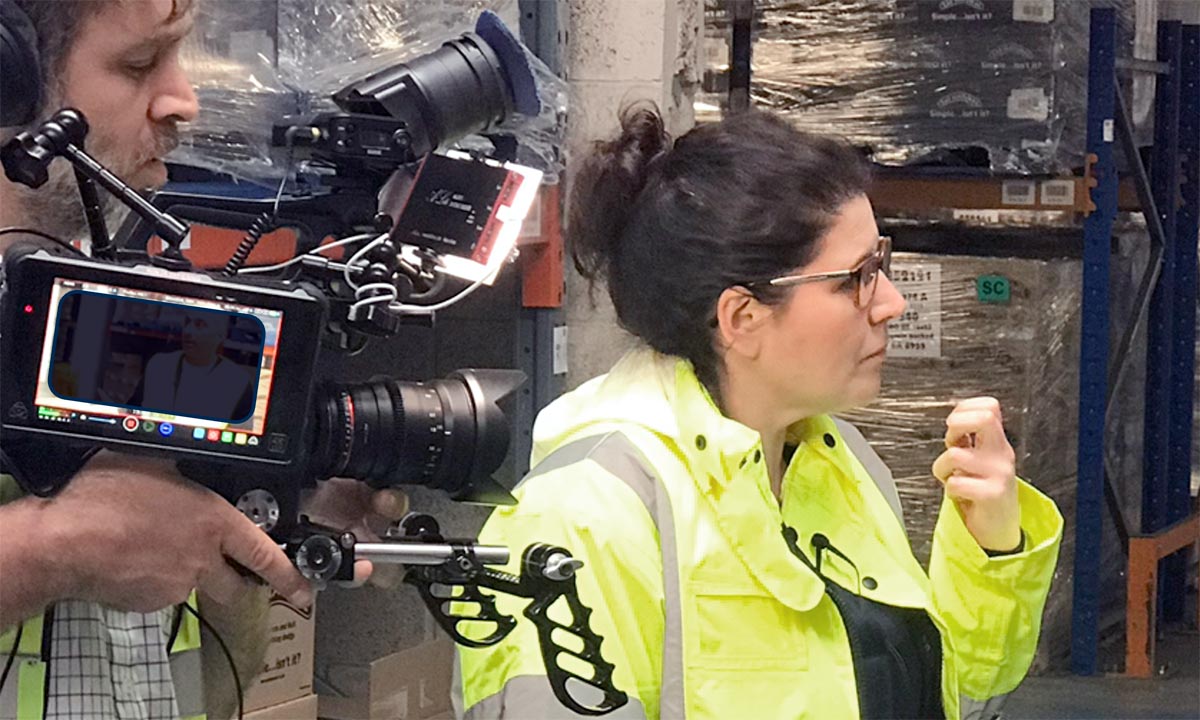 Abby Mangold on factory floor ahead of filming for BBC Inside the Factory