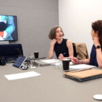 Abby Mangold and Jess Mangold in meeting
