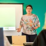 Abby Mangold presenting to clients
